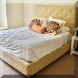 F37. King bed with upholstered headboard. 62”h 